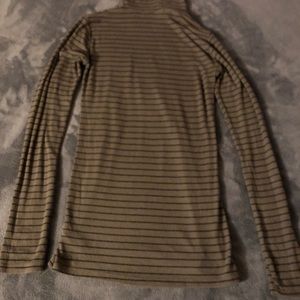 Green and black turtleneck